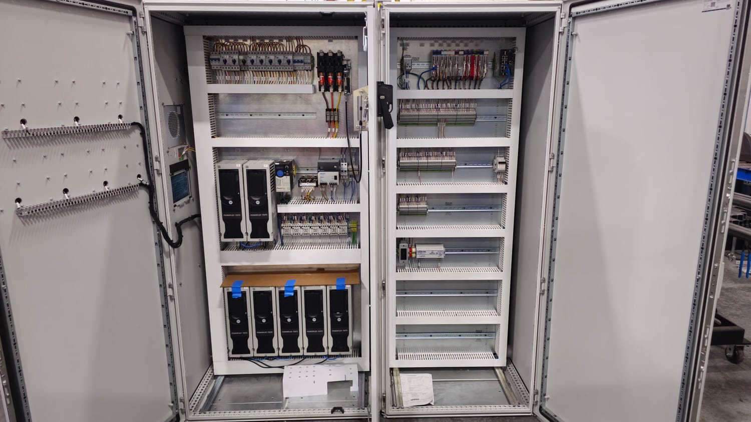 Wired control cabinets with PLCs and drives